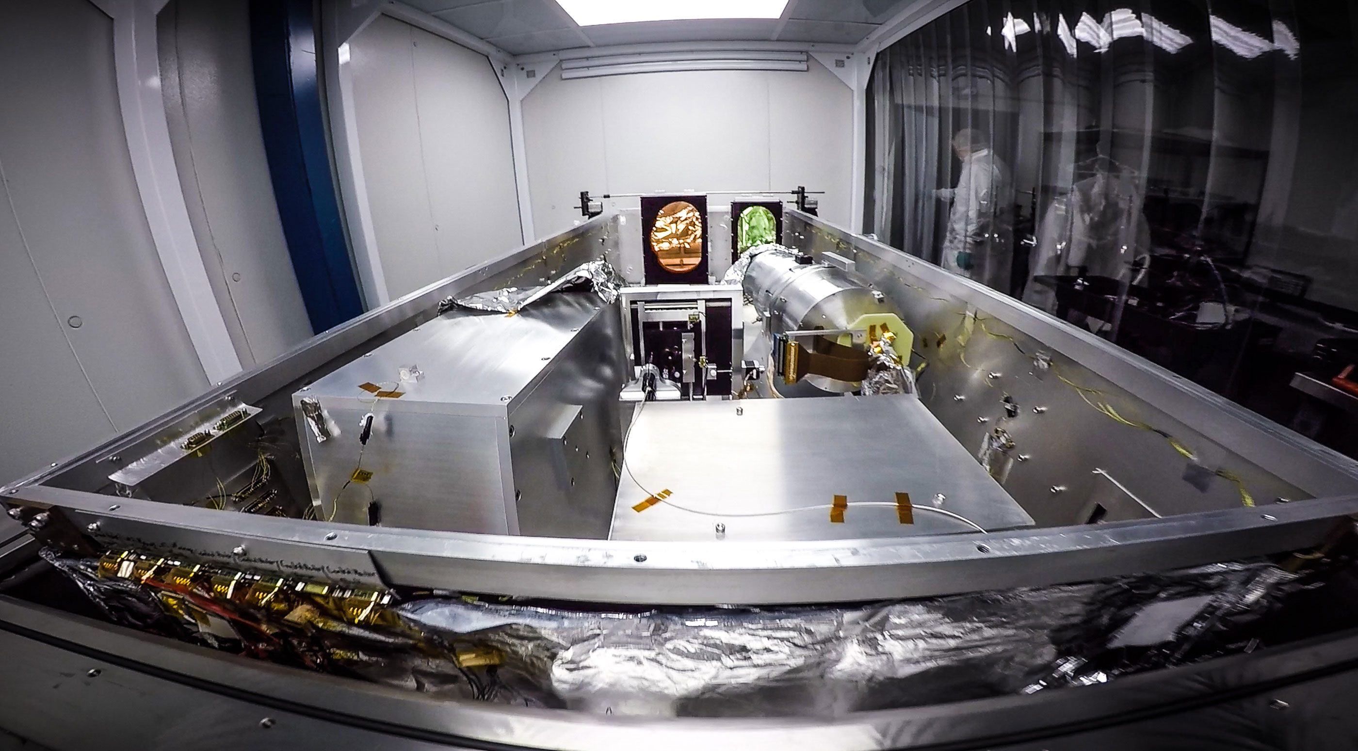 The new Penn State-led Habitable Zone Planet Finder (HPF) provides the highest precision measurements to date of infrared signals from nearby stars. Pictured: The HPF instrument during installation in its clean-room enclosure in the Hobby Eberly Telescope at McDonald Observatory. Photo Credit: Guðmundur Stefánssonn, Penn State.