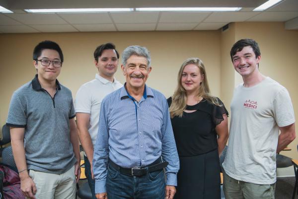 Leonid Berlyand poses with members of his research group