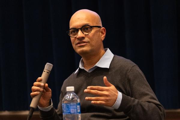 Santhosh Girirajan speaking to the Village at Penn State during Brain Awareness Week.