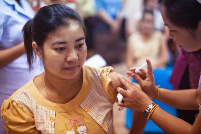 girl receiving vaccine shot