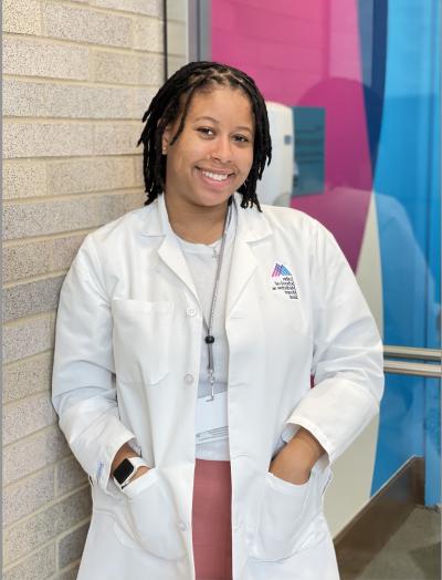 Breiuana White wearing lab coat