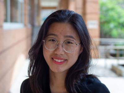 Ellie Kim posing outside