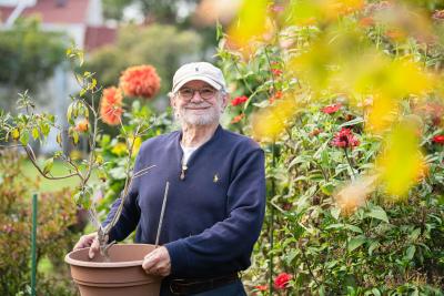 Joe Moffitt among flowers