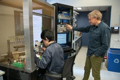 Timothy Jegla and a graduate student working in his lab.