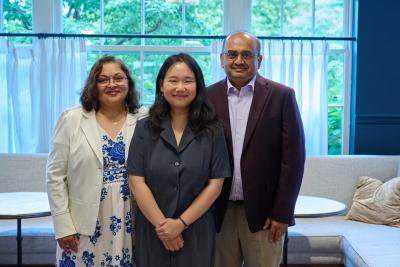Changemaker scholarship winner Yun Song standing between two of the scholarship's donors.