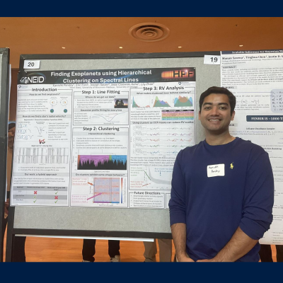 Kanishk Pandey standing in front of a poster at the ICDS Symposium.