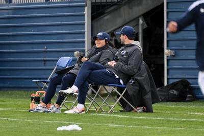 Abby Han on the sidelines of the soccer pitch for her job.