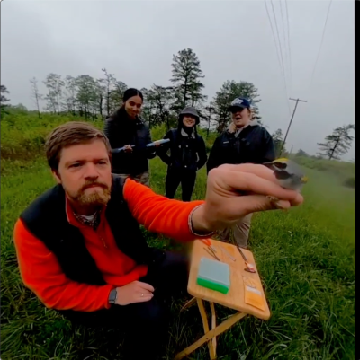 Dave Toews holding a bird in the VRmivora program.