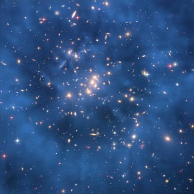 hubble image of a galaxy cluster with a blue hue