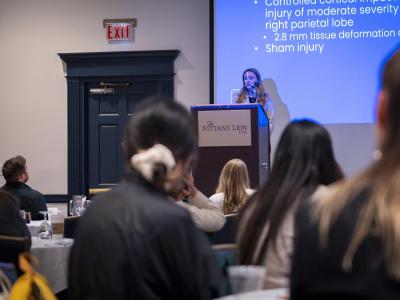Haley Capeci, an undergraduate student from the University of Pittsburgh, speaks at the Big10 Neuroscience Annual Meeting in July 2025.