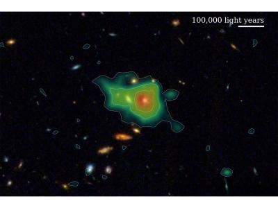 green area of hydrogen gas superimposed on JWST galaxy image