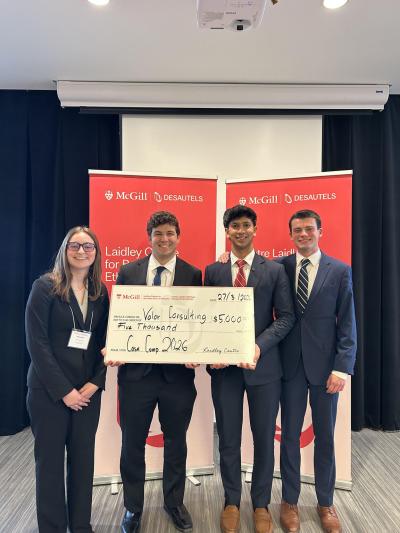 The Penn State Smeal College of Business Business Ethics Team who won the McGill Desautels Business Ethics Case Competition in Montreal. Members of the team are pictured holding a large check.
