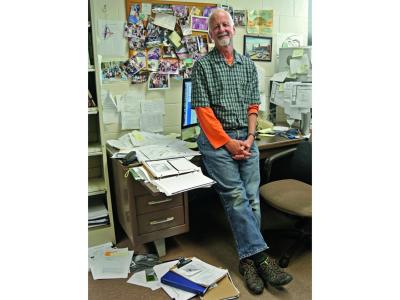 The late Chris Uhl standing in his office at Penn State. 