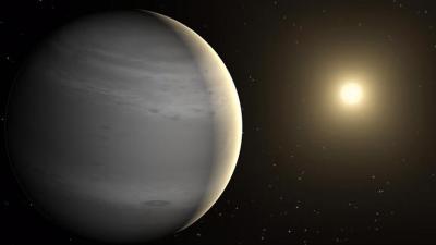 gas giant planet in foreground with a sun in background