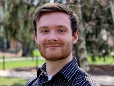 Headshot of Kieran Sturges.