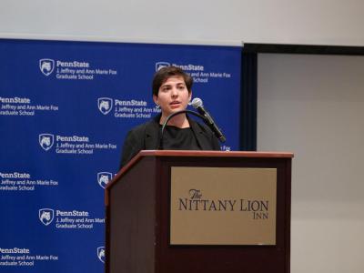 Someone presenting at the Nittany Lion Inn during the Grad School's 3 Minute Thesis competition.