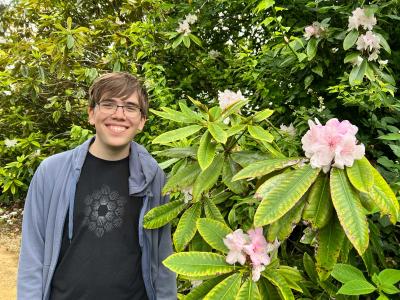 Connor Hill next to rhododendrons