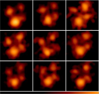 A mosaic of X-ray images of the quasar Q2237+0305, magnified by a gravitational lens. The bright spots are four magnified images of the same quasar, which change in brightness over time. Credit: C.S. Kochanek, Ohio Sate University