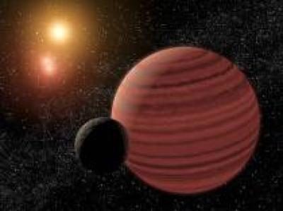 Credit: NASA Artist's rendition of a brown dwarf and its moon orbiting a triple star system.