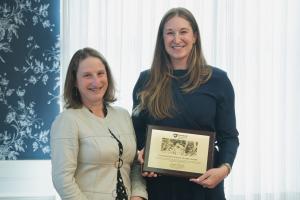 Jocelyn Fitzgerald accepting the Outstanding Science Alumni Award from Dean Tracy Langkilde.
