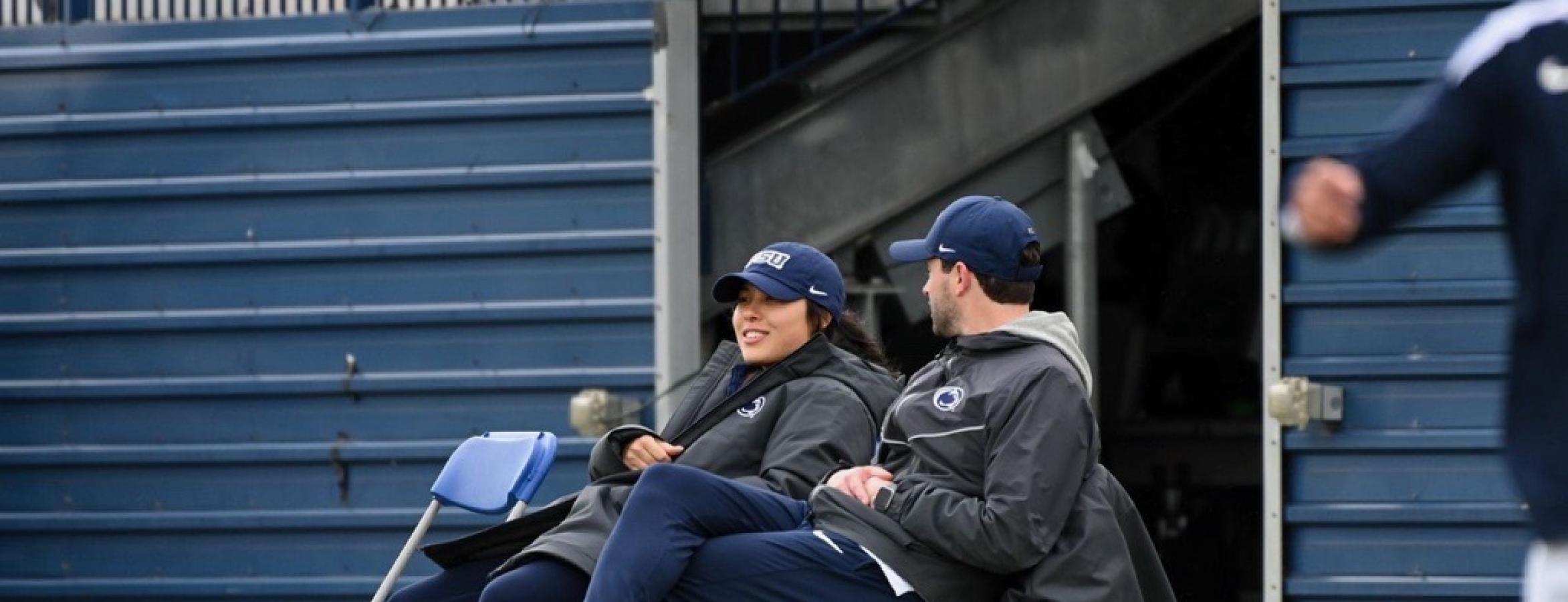Abby Han on the sidelines of the soccer pitch for her job.