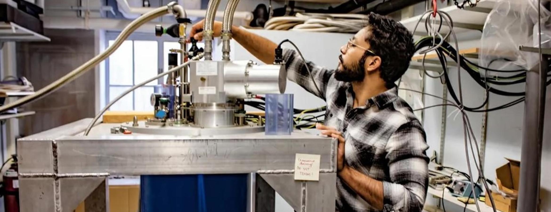 Jyotirmay Dwivedi handles equipment in Nitin Samarth's lab