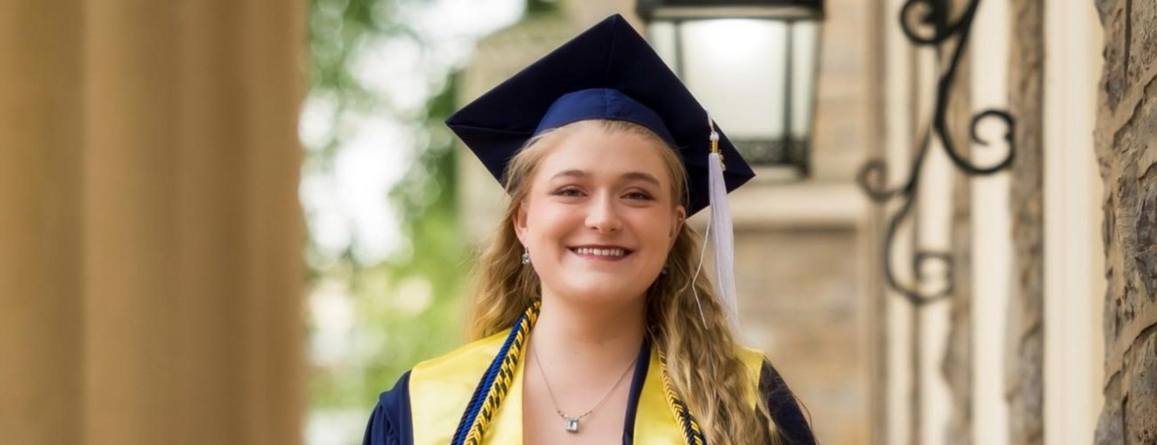 Kaylen Sitzabee in graduation gown