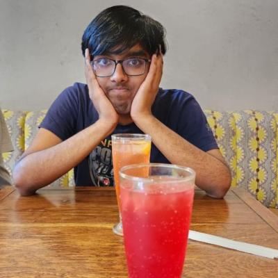 Me staring at a mocktail in front of another mocktail