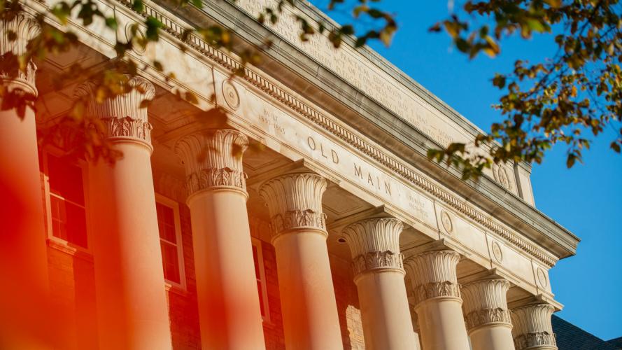 The portico of Old Main at the University Park campus during the fall.
