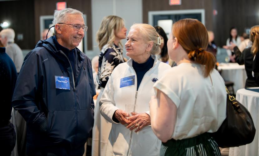 College benefactors talking with a student during the 2024 Eberly Benefactor Reception.
