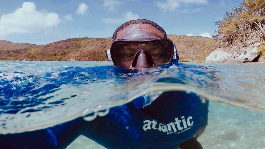 Colin Howe snorkling in water