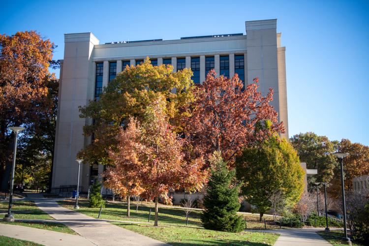 Müller Laboratory during early october with fall foliage in the foreground.