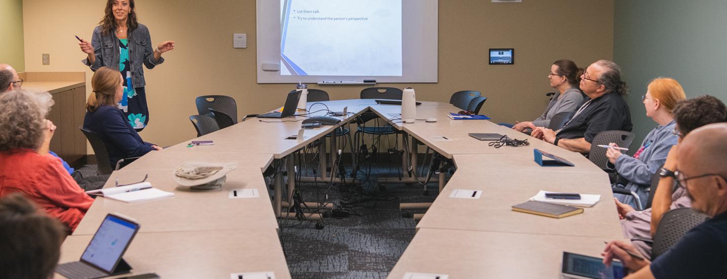 College Guide Program members during an orientation meeting held in Ritenour Building.