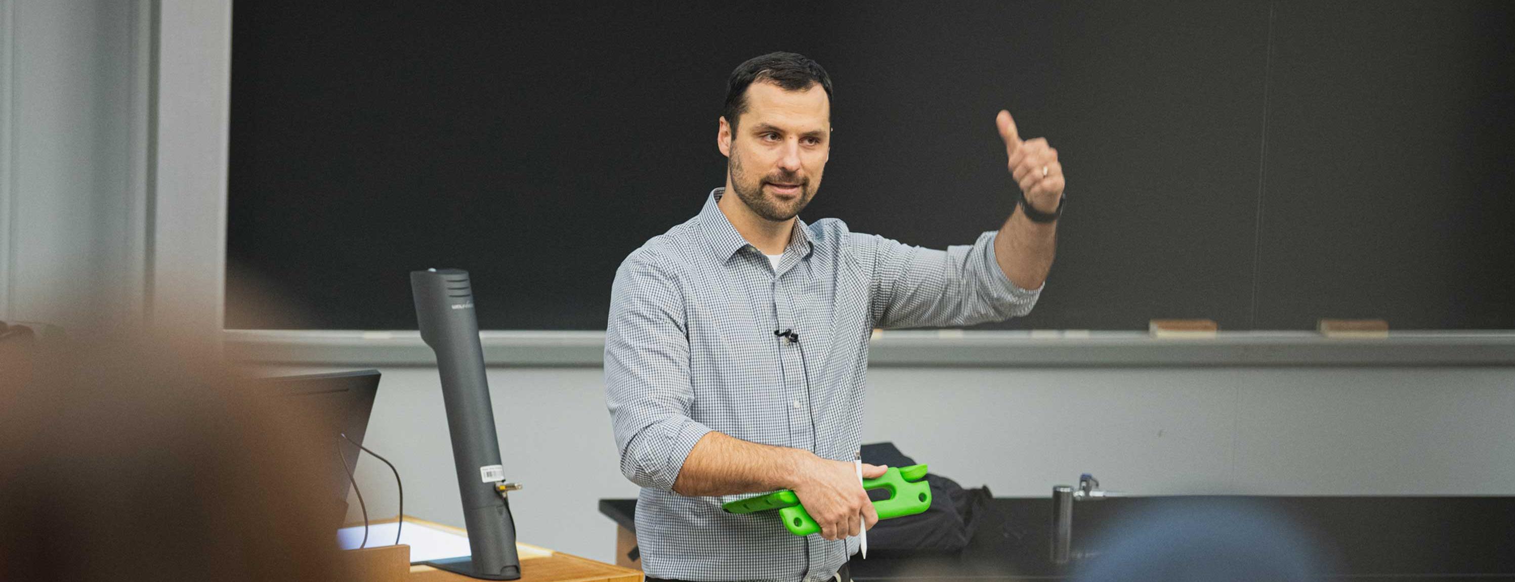 Matt Beckman gives lecture in classroom