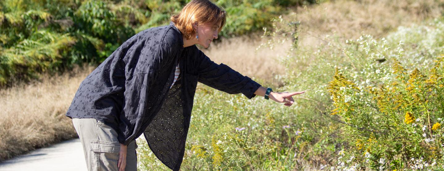 Fourth-year student Erika working in the field.