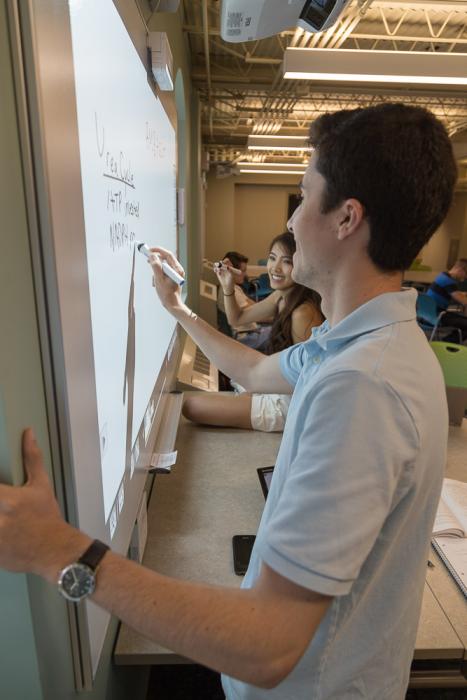 students using a whiteboard