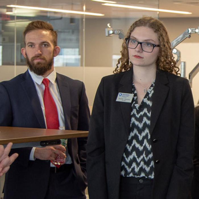 Science and business students on a trip to Wall Street.