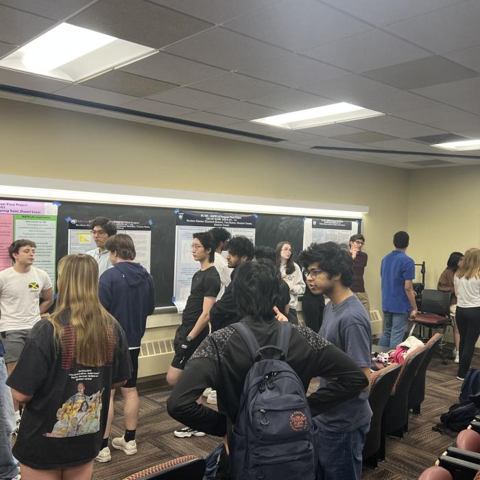 Students participating in a math learning assistant meeting.