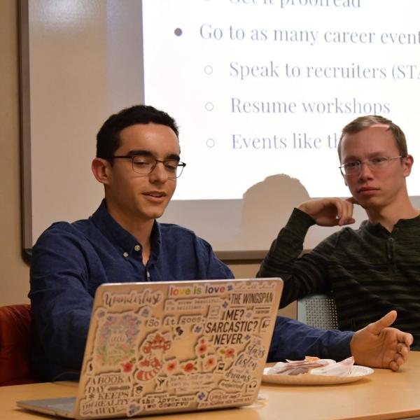 Two undergraduate students working in one of the collaborative learning spaces available in the college.