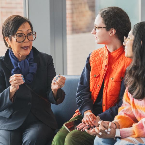 Dazzle Dry creator Vivian Valenty talking to students during the spring 2026 Dazzle Dry event at the University Park campus.