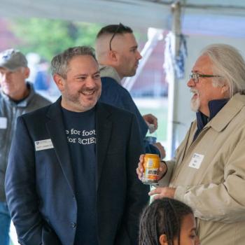 Scott Showalter talking to Bob Boor at the Homecoming tailgate. 