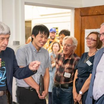 John Panitz (at left) spoke during the inaugural tour of an exhibition of Erwin Müller's historic equipment, at the college's “Celebrating Penn State’s Milestones in Physics” event on Sept. 5.