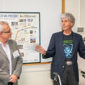 John Panitz (at right) spoke during the inaugural tour of an exhibition of Erwin Müller's historic equipment, at the college's “Celebrating Penn State’s Milestones in Physics” event on Sept. 5.