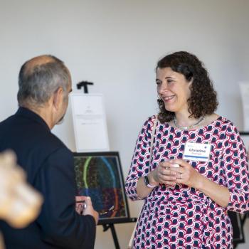 Attendees mingled at the Palmer Museum of Art before the first day of symposium proceedings.
