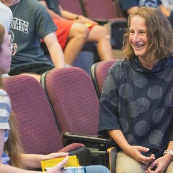 Dean Tracy Langkilde talking to a student at the Dean's Welcome event for Penn State Eberly College of Science students.