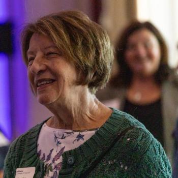 Attendee of the Science Matters: Spotlight Sessions smiling 