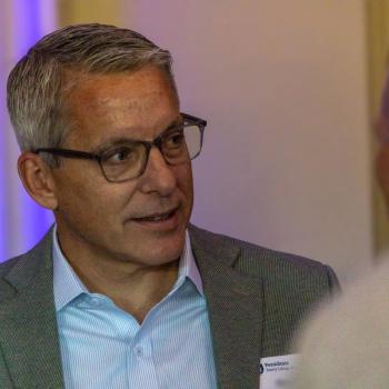 Steven Maslowski speaking with others at the Franklin Institute