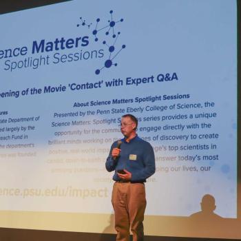 Jason Wright in front of projection screen