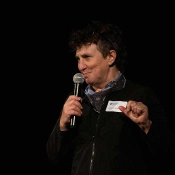 Jen Macalady holding microphone